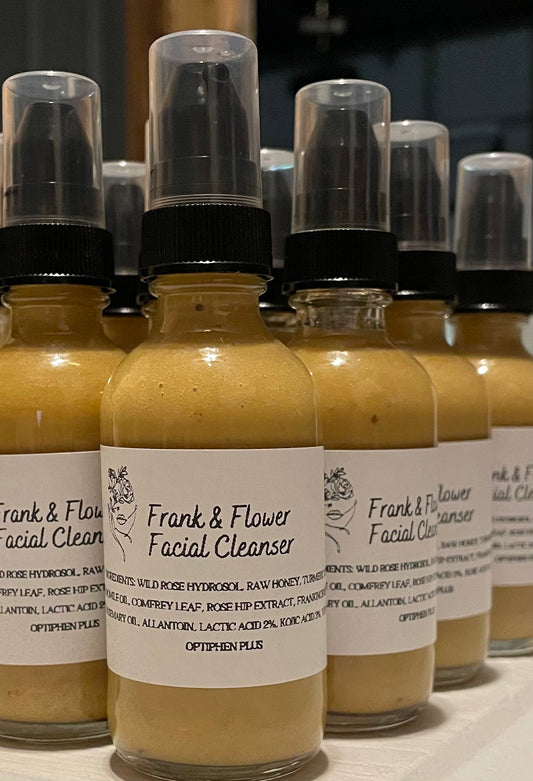 Frank & Flower Turmeric & Kojic Acid based Facial Cleanser 2 oz glass pump bottle.